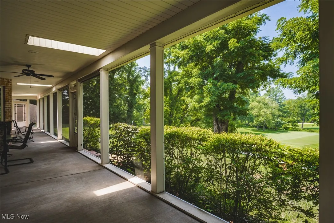 Screened porch is 70 ft long with beautiful views of the Golf course.