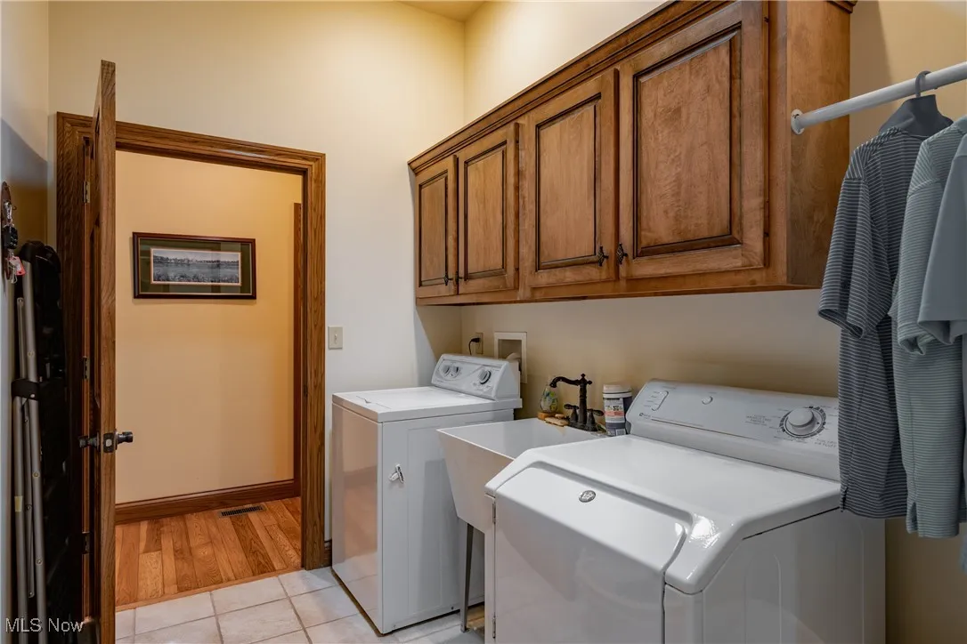 Laundry room is 7x9 and located between the side hall and the Master closet for added convenience.