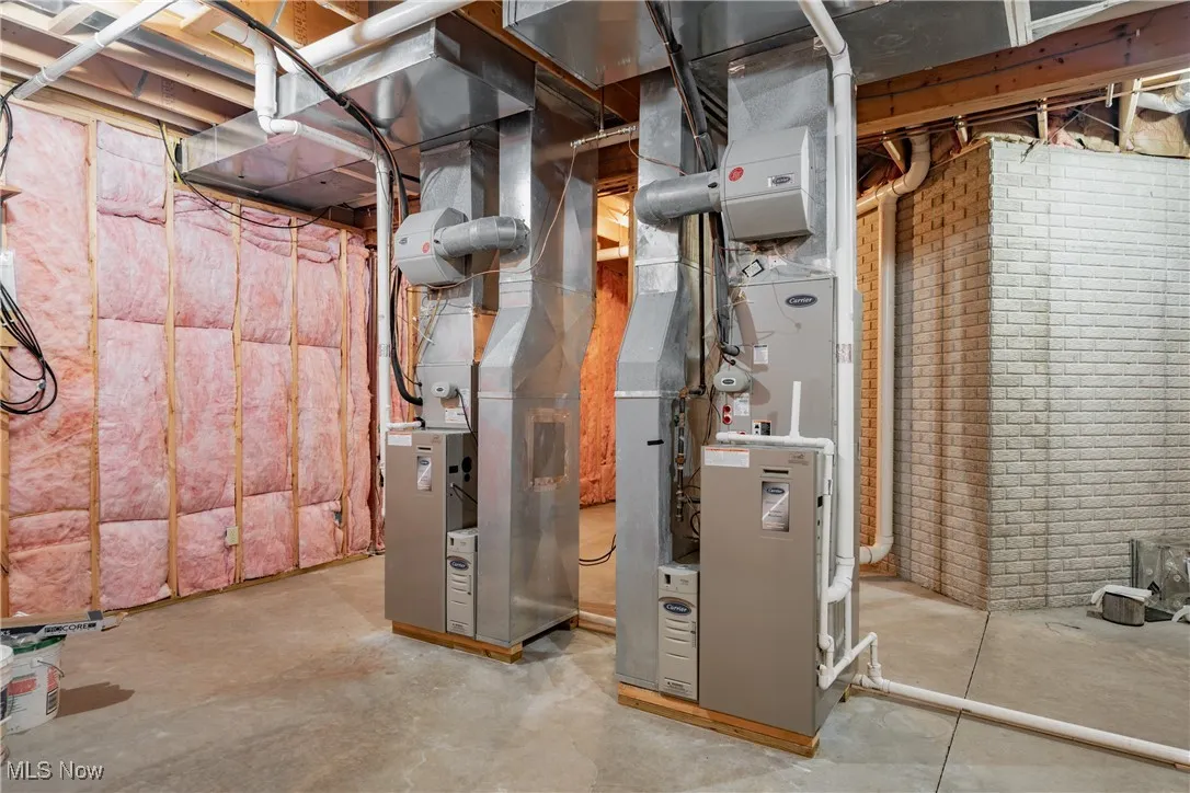 Utility room is 25x26 showing the 2 HVAC systems.