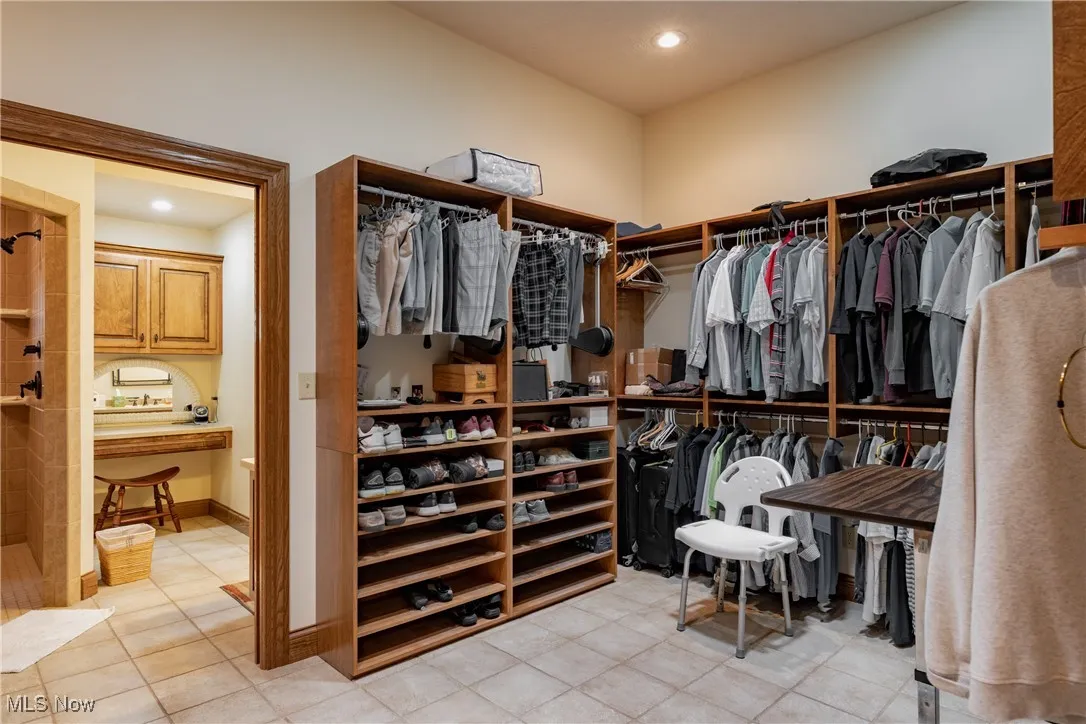 Master closet is 10x16 with ceramic floors, plenty of storage space and built-ins