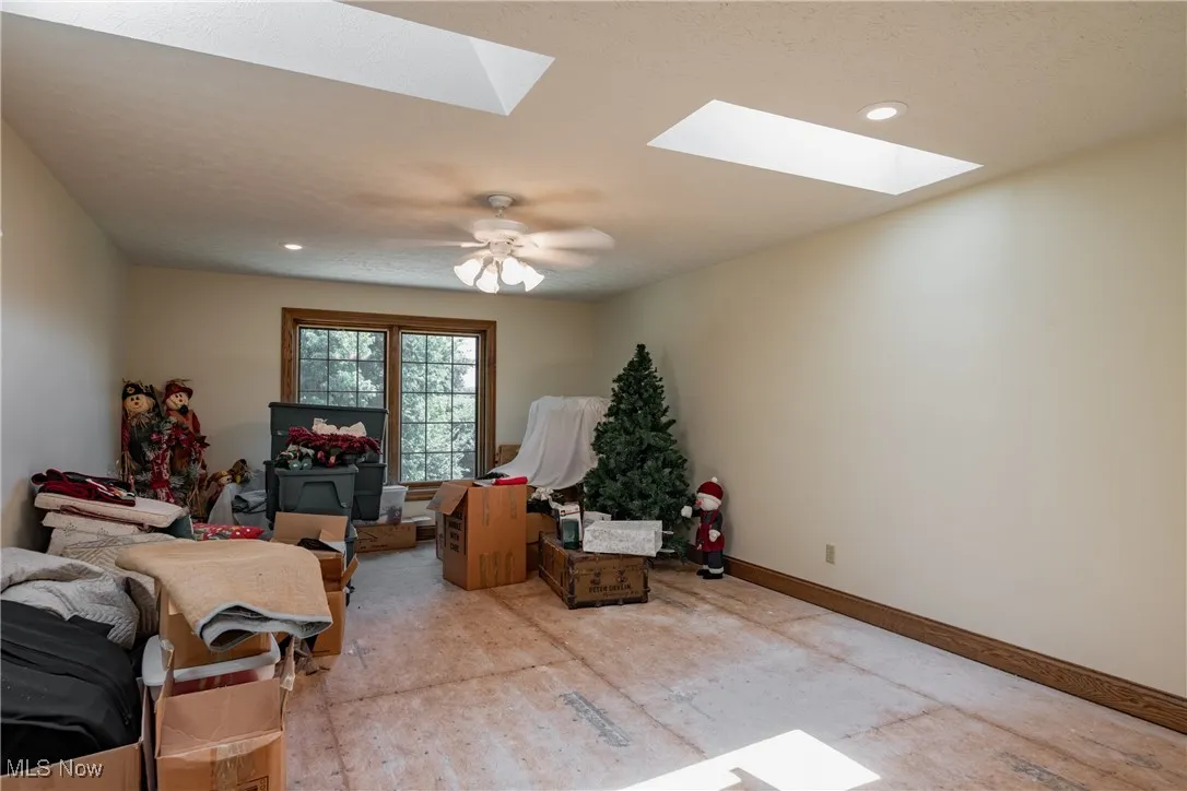 Unfinished in-law suite above garage is 14x33. All it needs is a floor finish