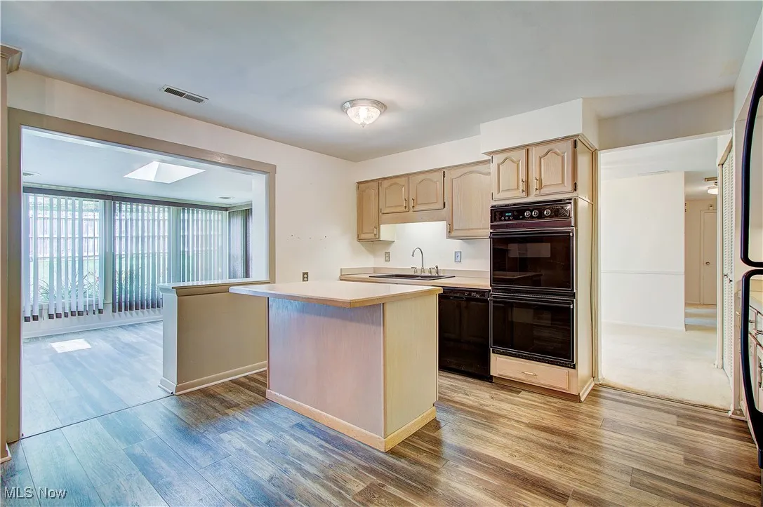 From the kitchen looking in to the sunroom.