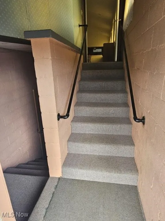 Stairway with concrete block wall
