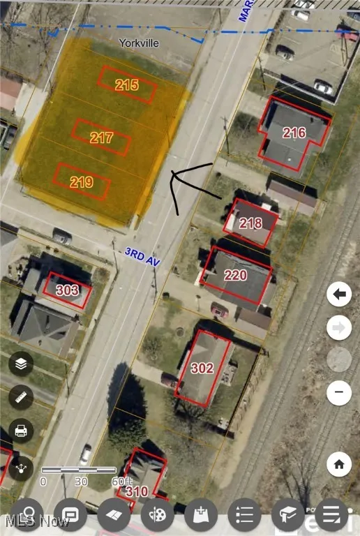 Aerial map of property and surrounding area with property parcel outlined