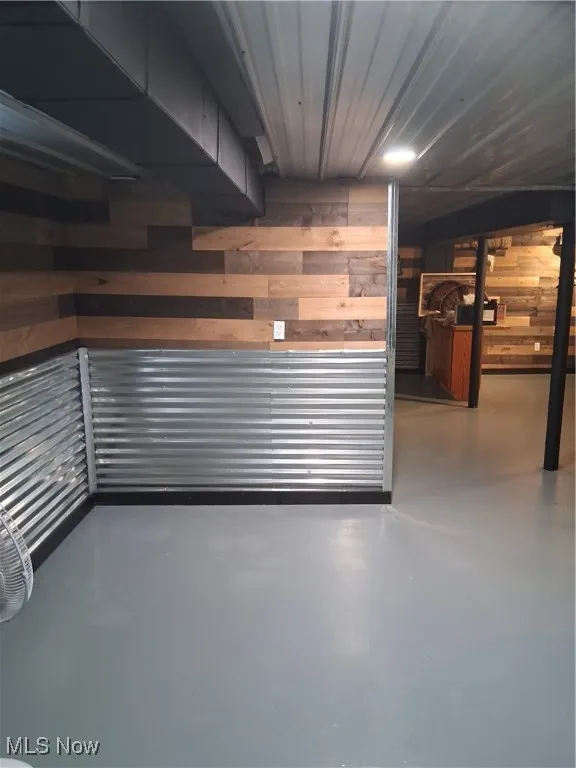 Finished below grade area with wood walls