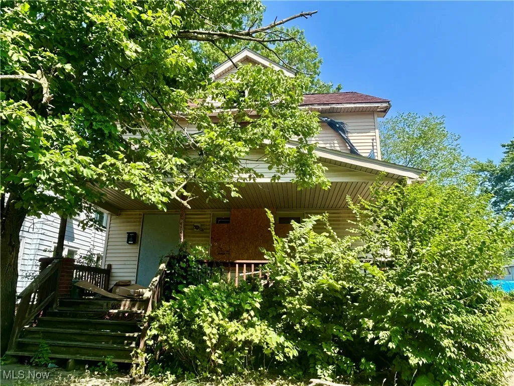 View of front of home with covered porch