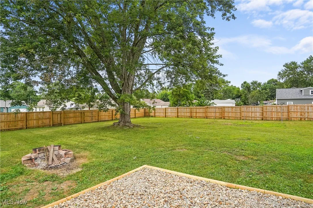 View of fenced backyard
