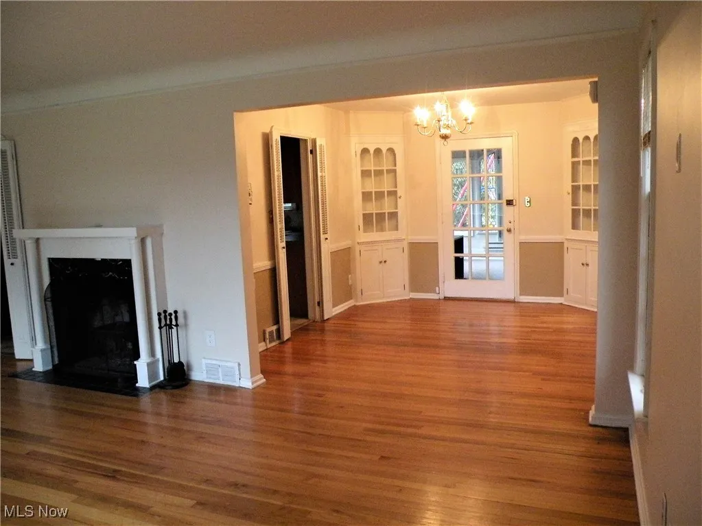 Living room opens to a large dining room.