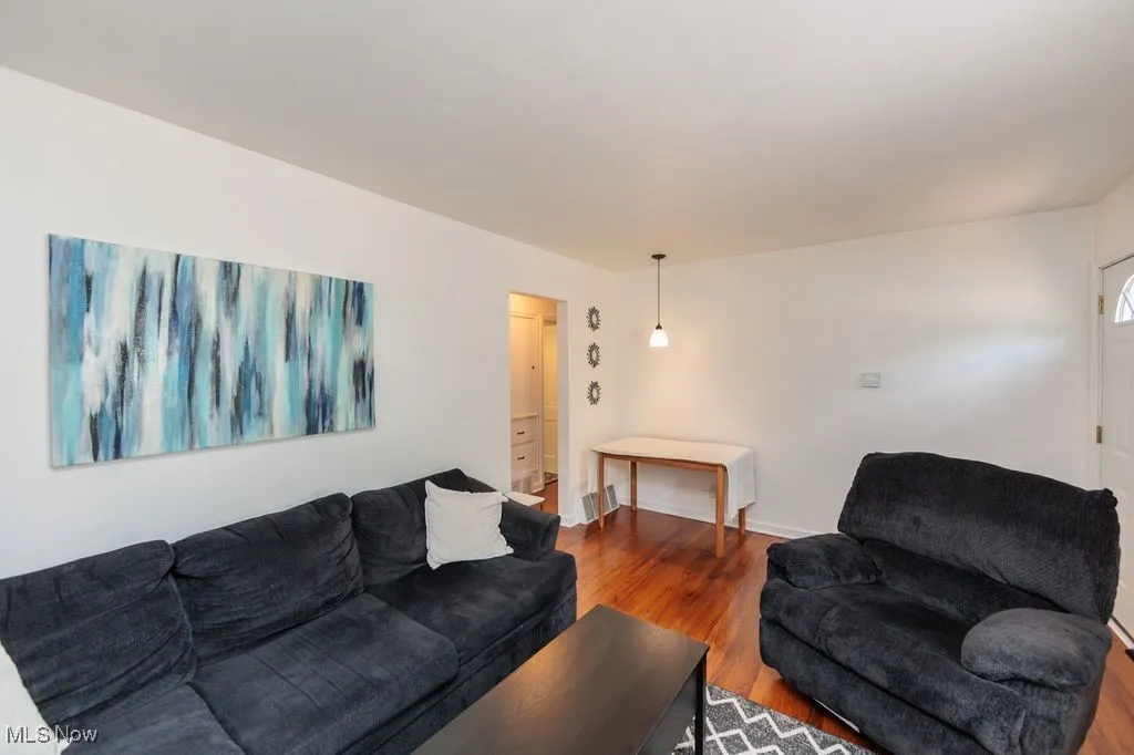Living room featuring wood finished floors