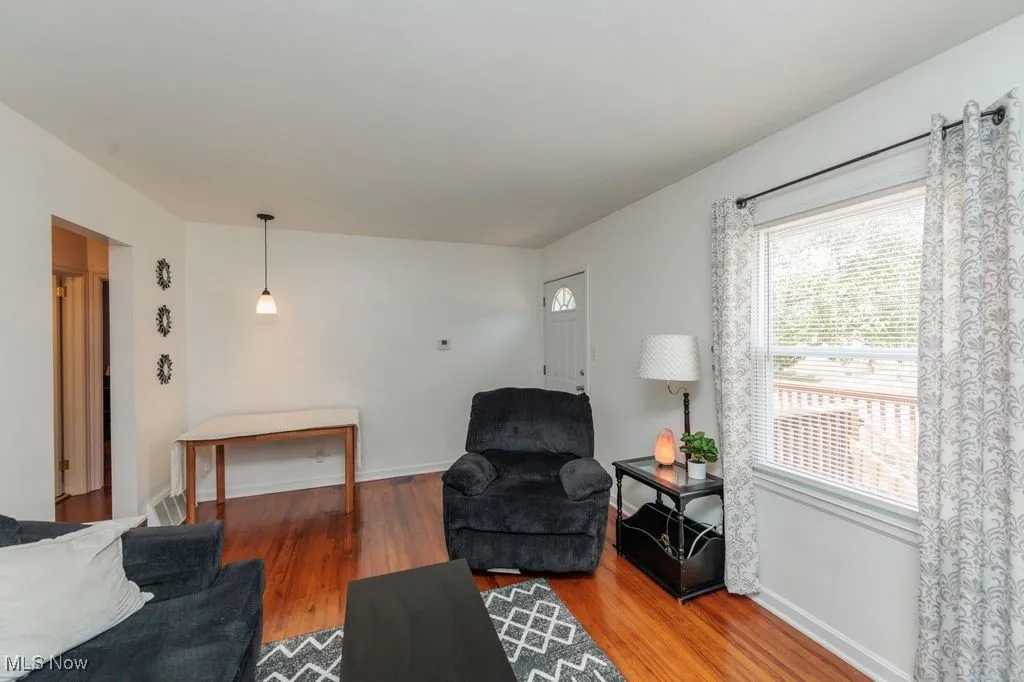 Living area featuring wood finished floors