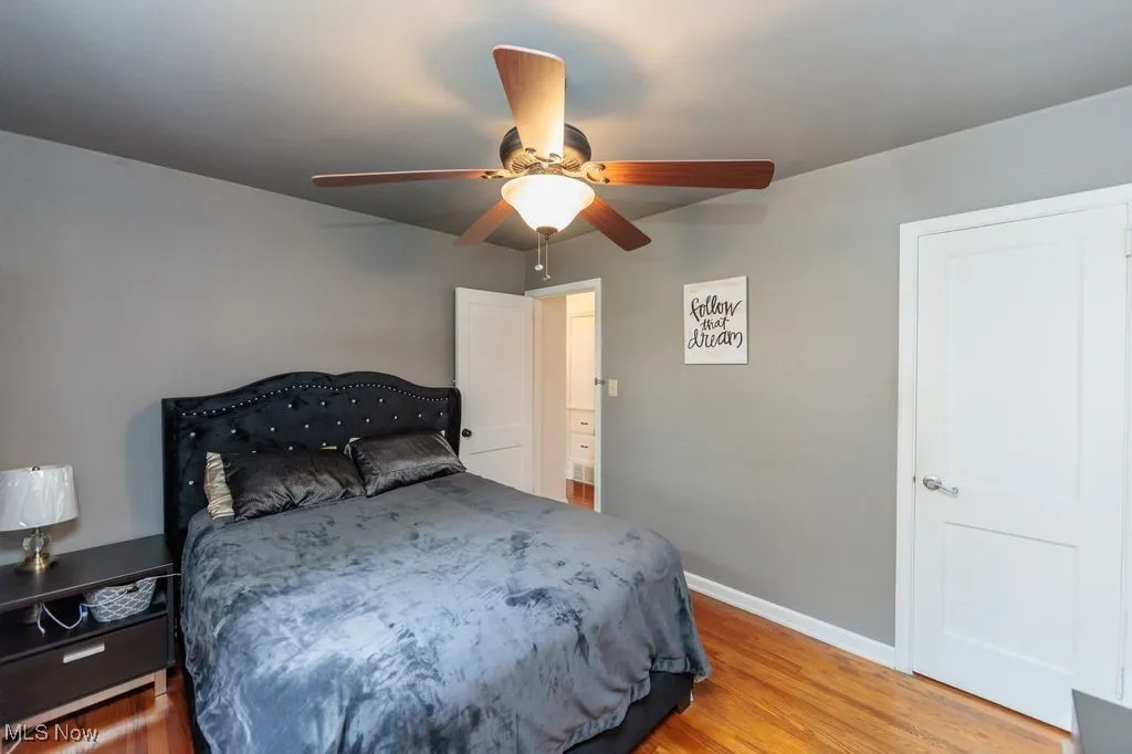 Bedroom featuring light wood-style flooring and ceiling fan