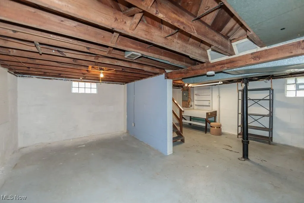 Basement featuring stairway