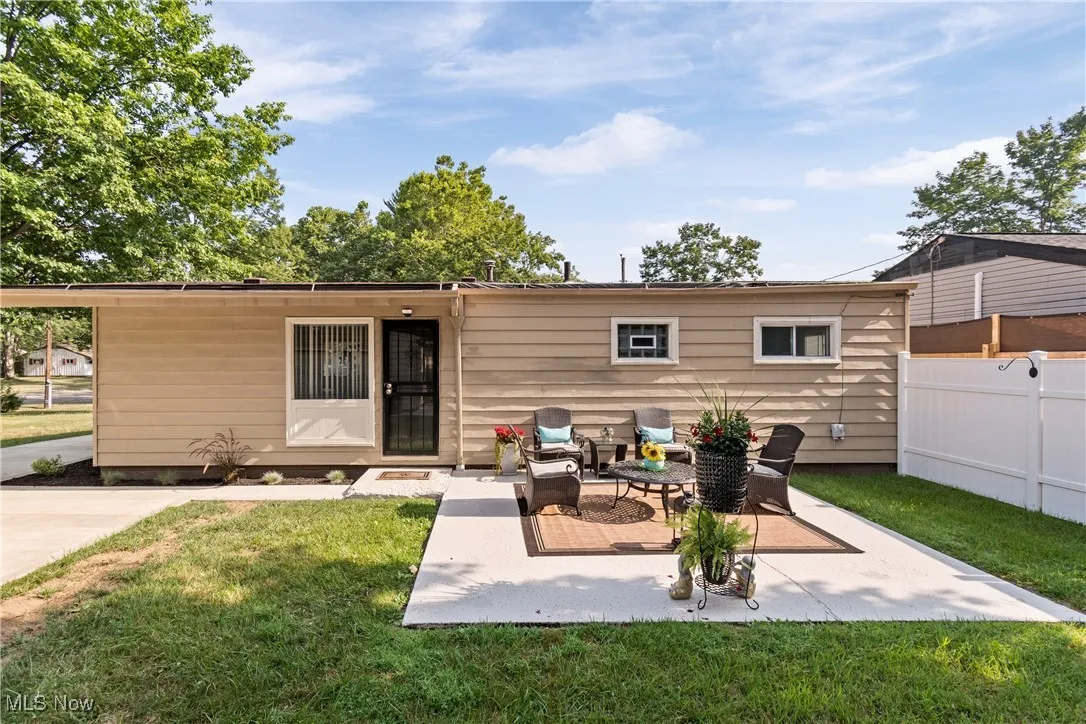 Rear view of house with a patio area