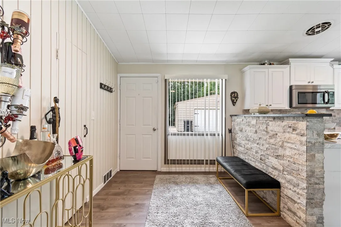 Mudroom featuring wood finished floors