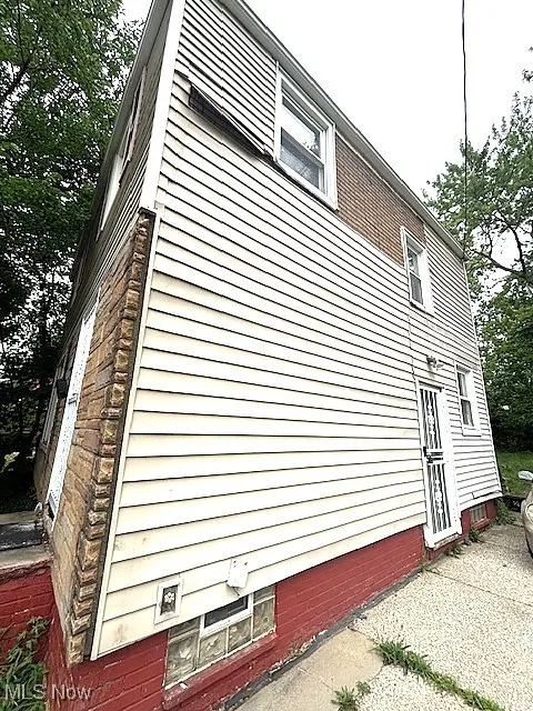 View of home's exterior with stone siding
