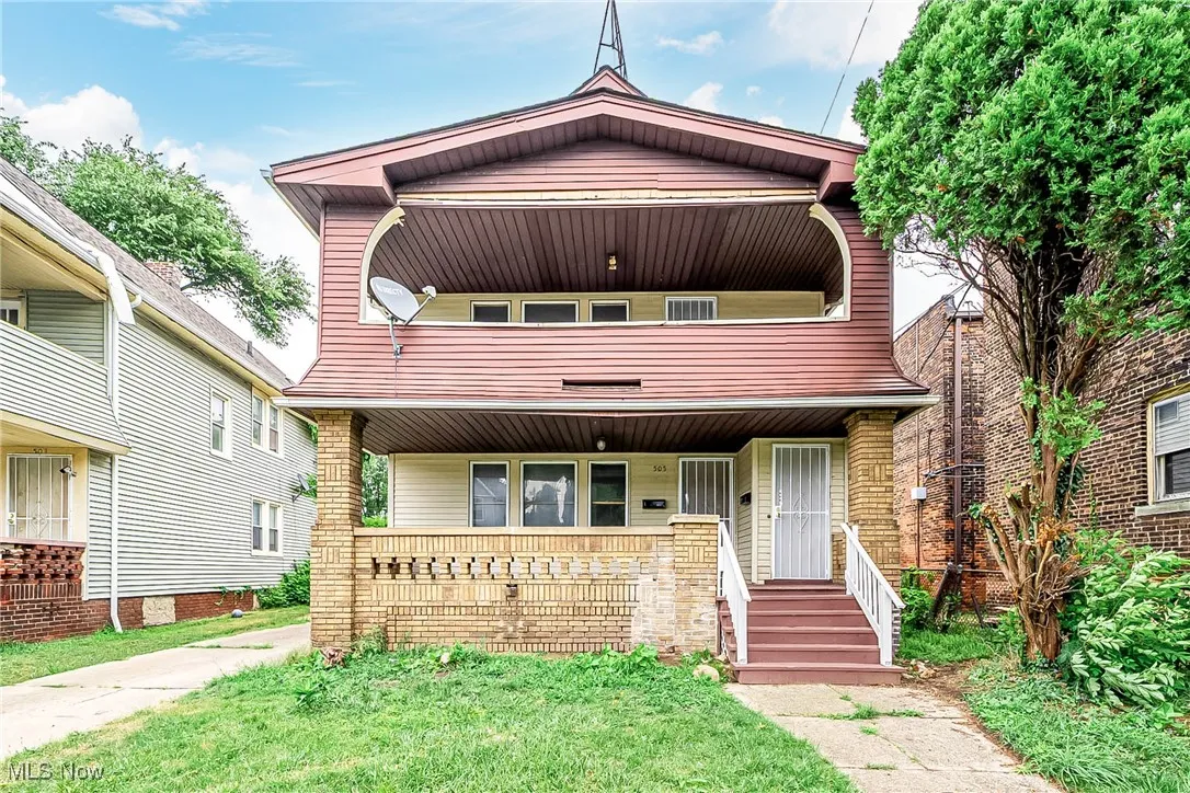 View of front of property featuring covered porch