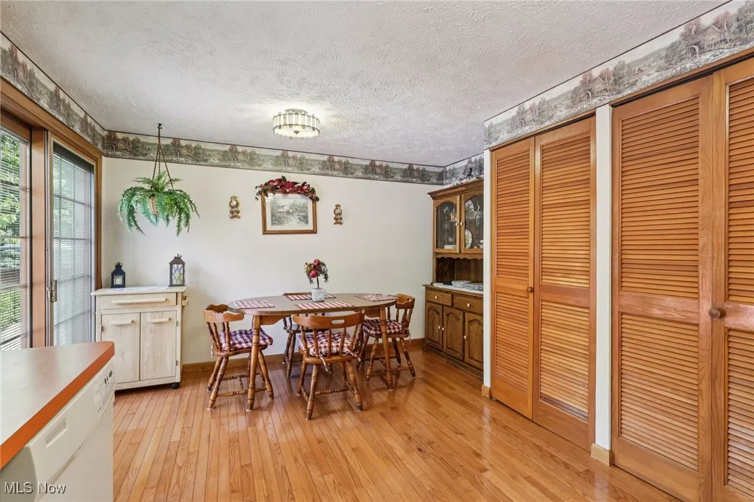 spacious eat-in kitchen with two pantries and slider providing entry to back yard 2 level deck