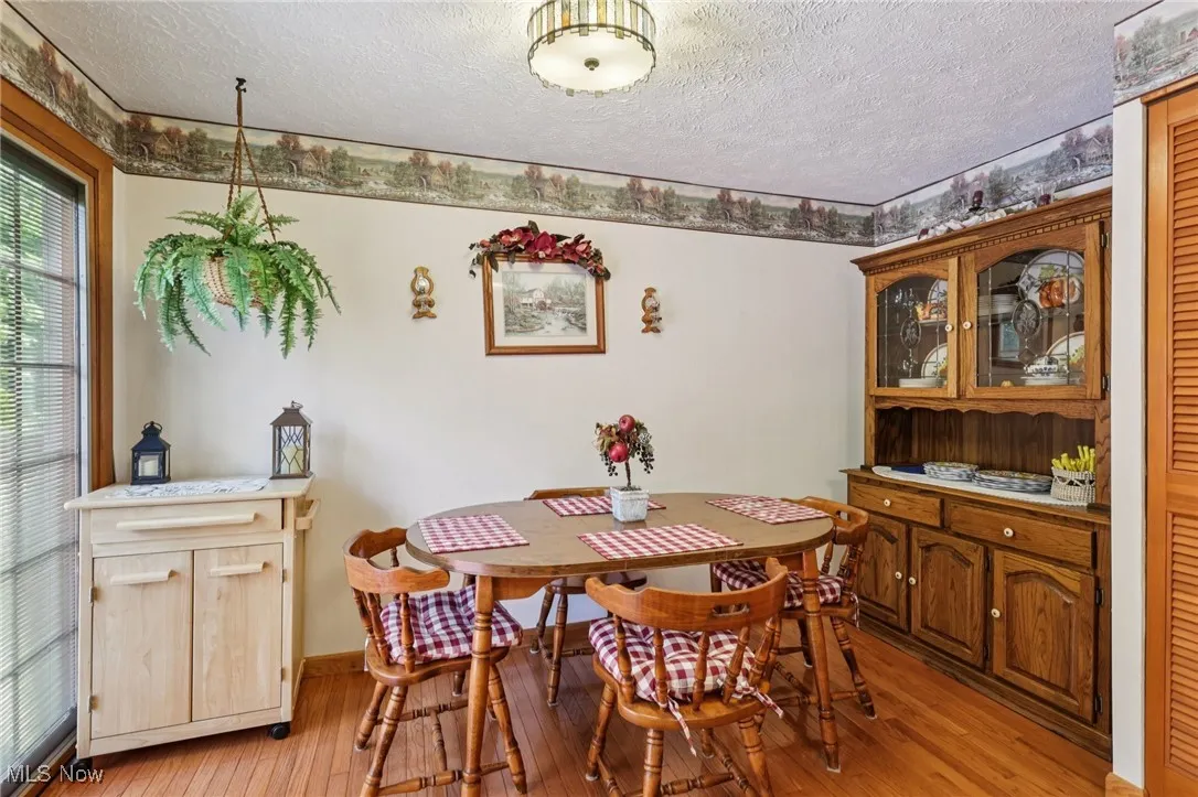 spacious eat-in kitchen with two pantries and slider providing entry to back yard 2 level deck. All appliances stay!