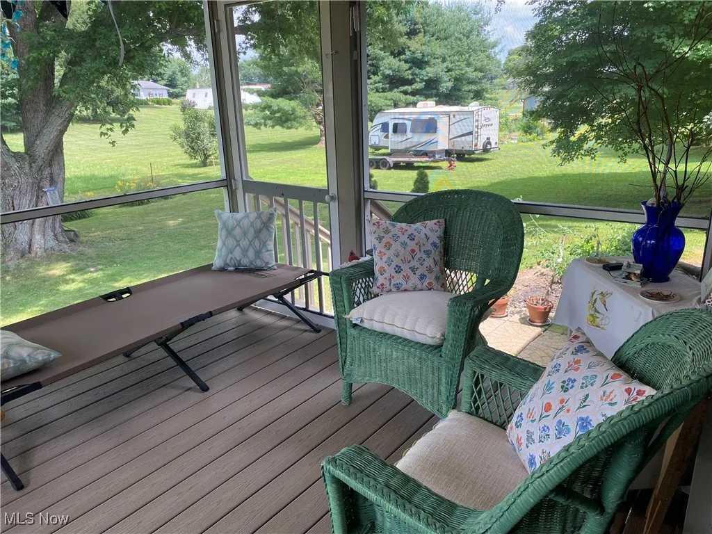 Deck featuring a lawn
