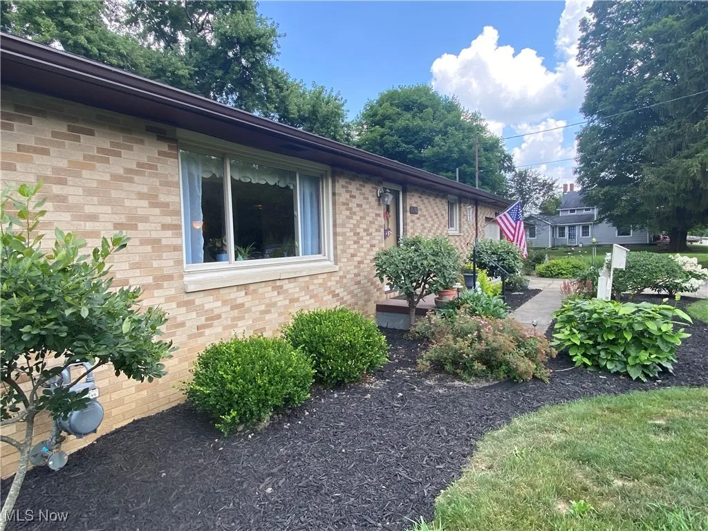 View of home's exterior with brick siding
