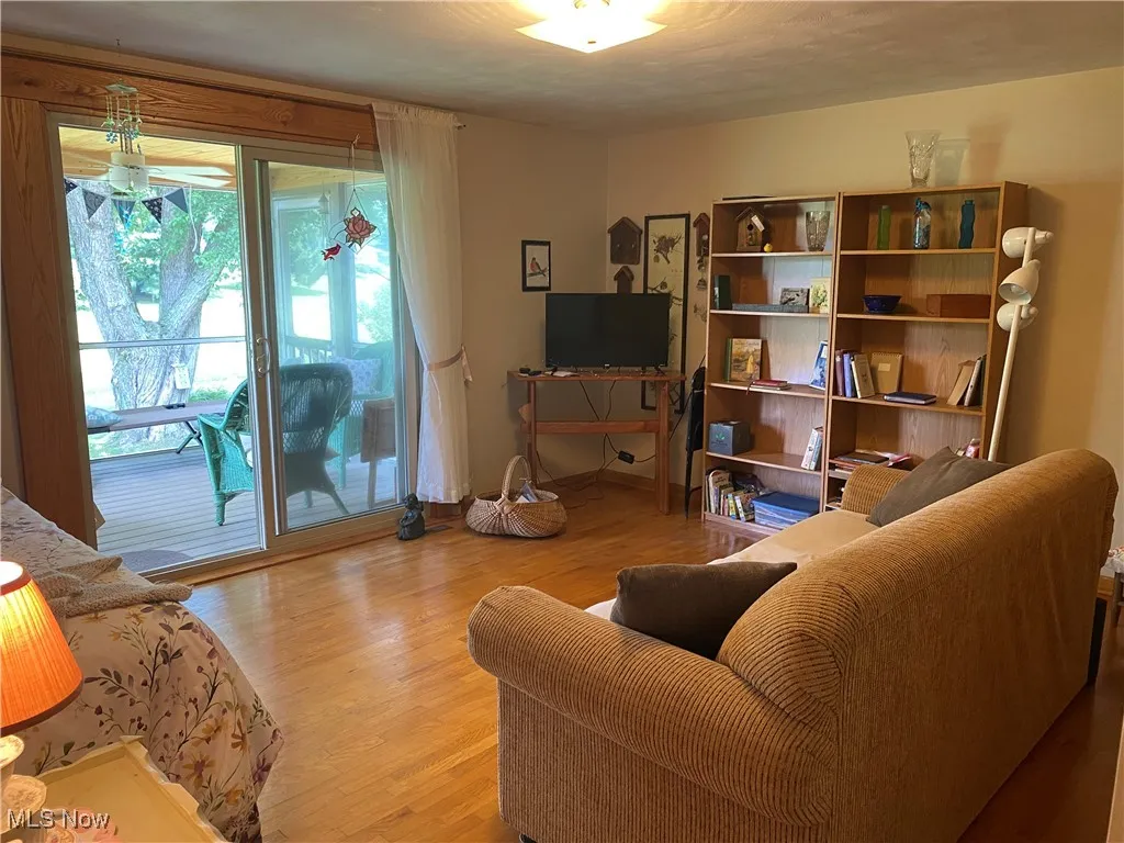 Living area featuring wood finished floors
