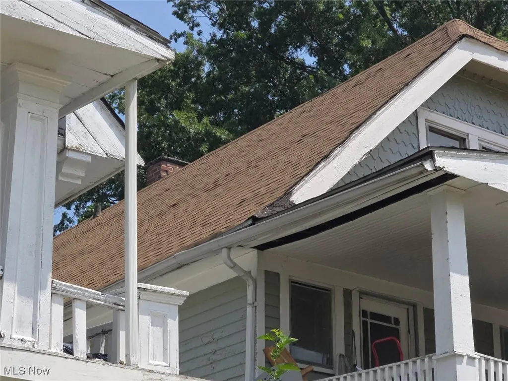 Exterior view of roof with shingles and gutters (Newer Roof)