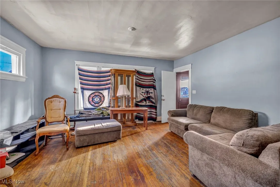 Living area featuring wood-type flooring