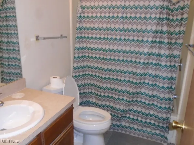 Full bath with vanity and toilet