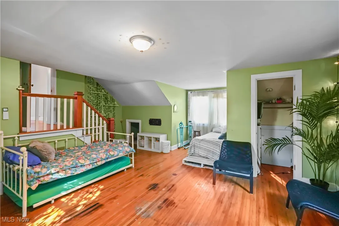 Bedroom featuring hardwood / wood-style floors