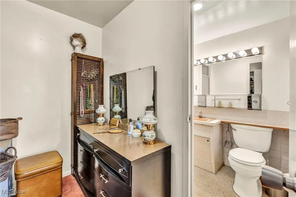 Bathroom with toilet and vanity