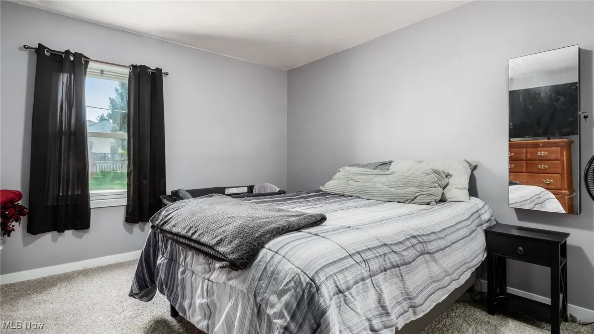 Bedroom with carpet