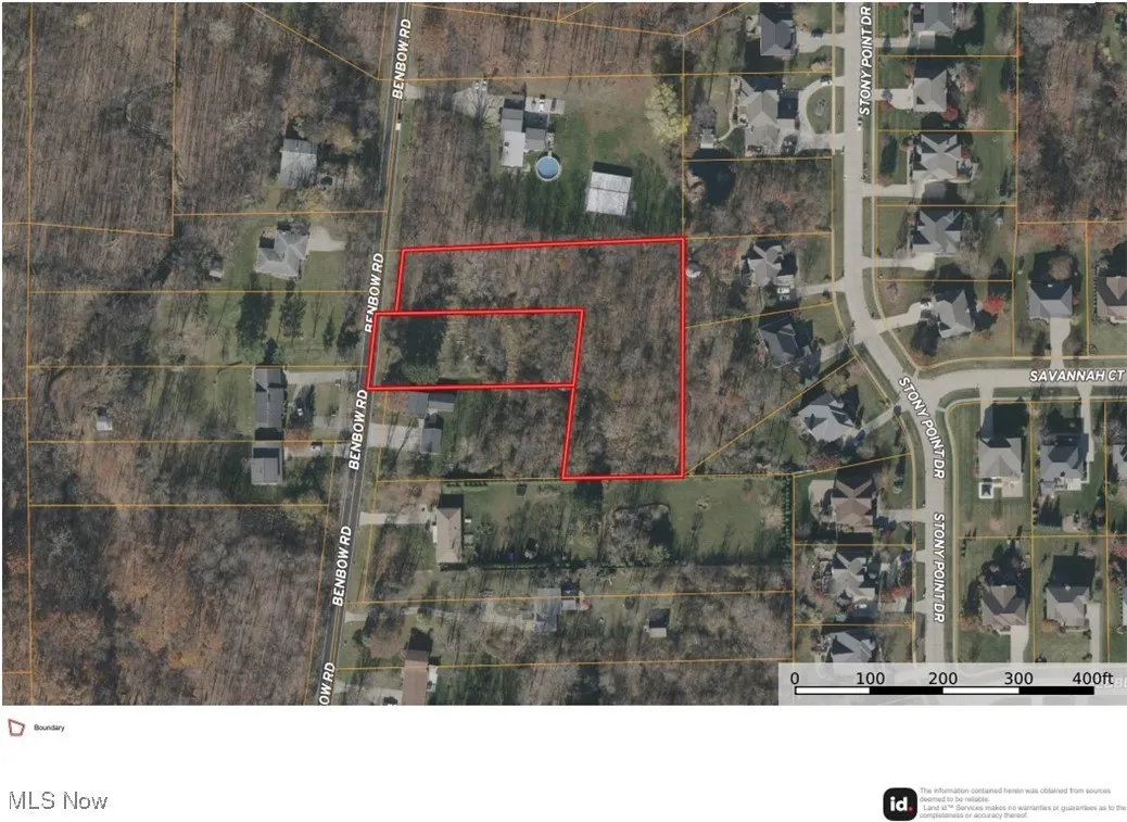 Aerial map of property and surrounding area featuring property boundaries highlighted