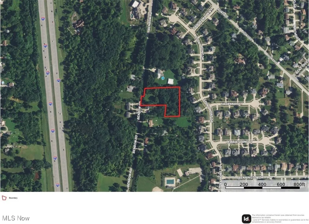 Aerial map of property and surrounding area with property parcel outlined