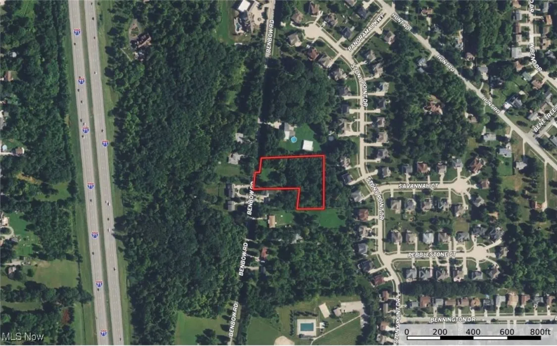Aerial overview of property's location featuring property parcel outlined