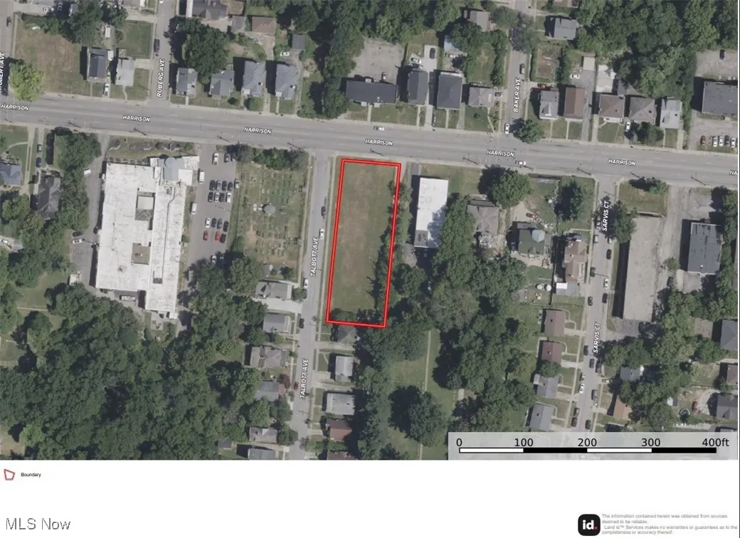 Aerial map of property and surrounding area featuring property parcel outlined