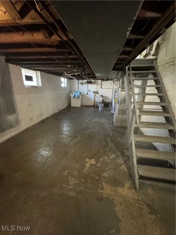Below grade area featuring stairway