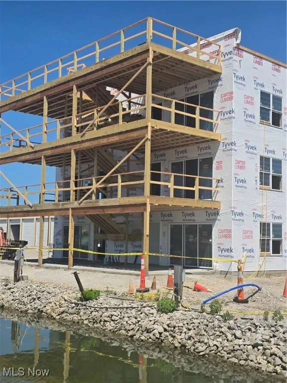 Front of Structure Featuring a water view