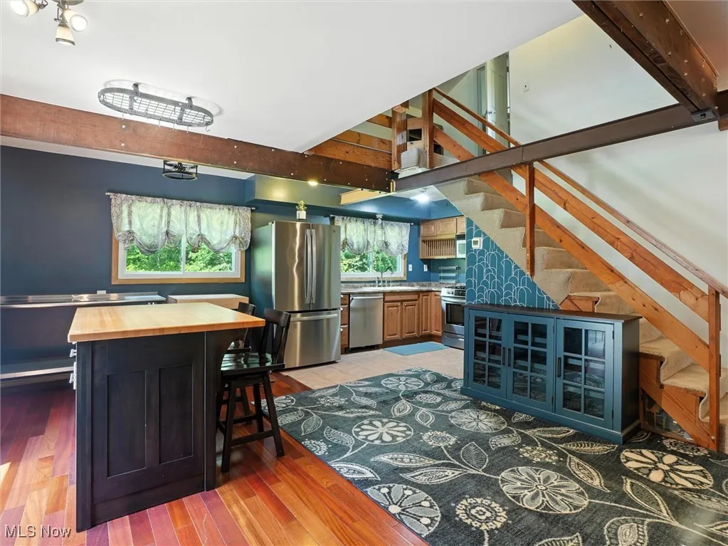 Kitchen with island and sliders to back deck