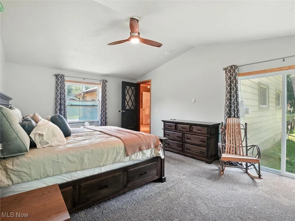 Bedroom features sliders to both the front and back yards