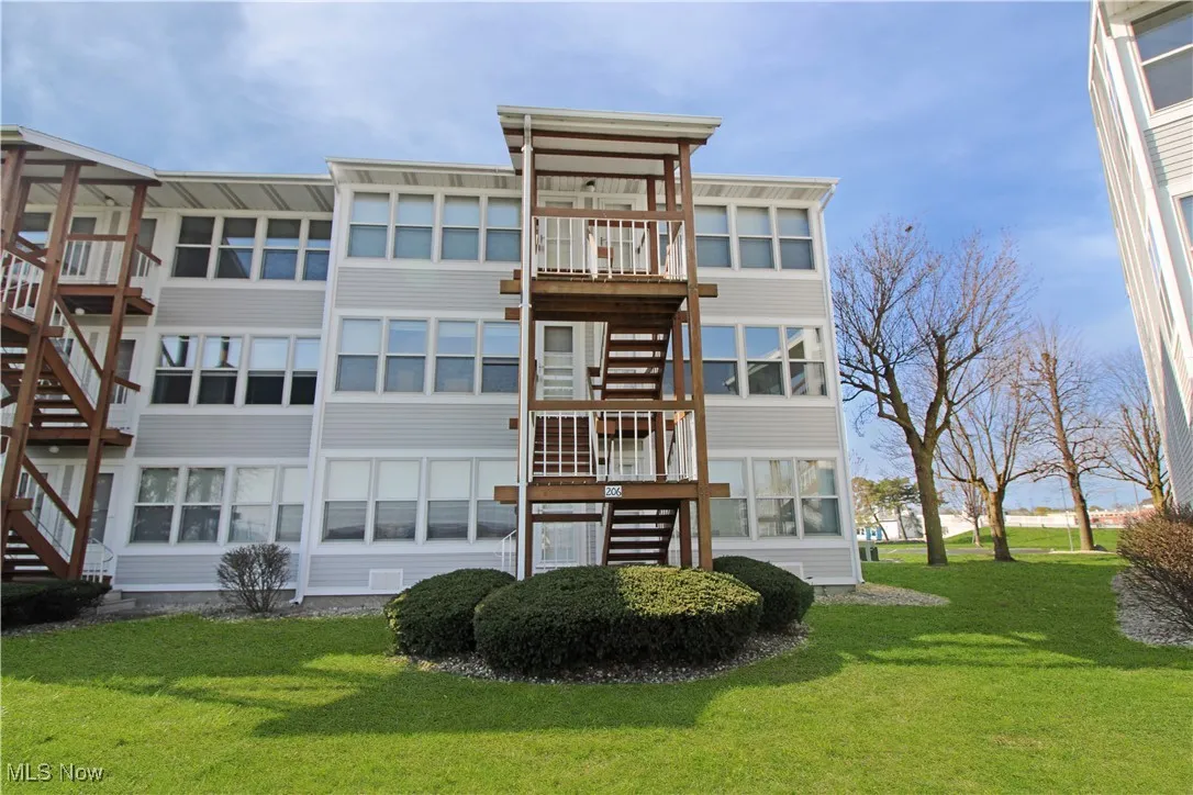 View of building exterior featuring stairway