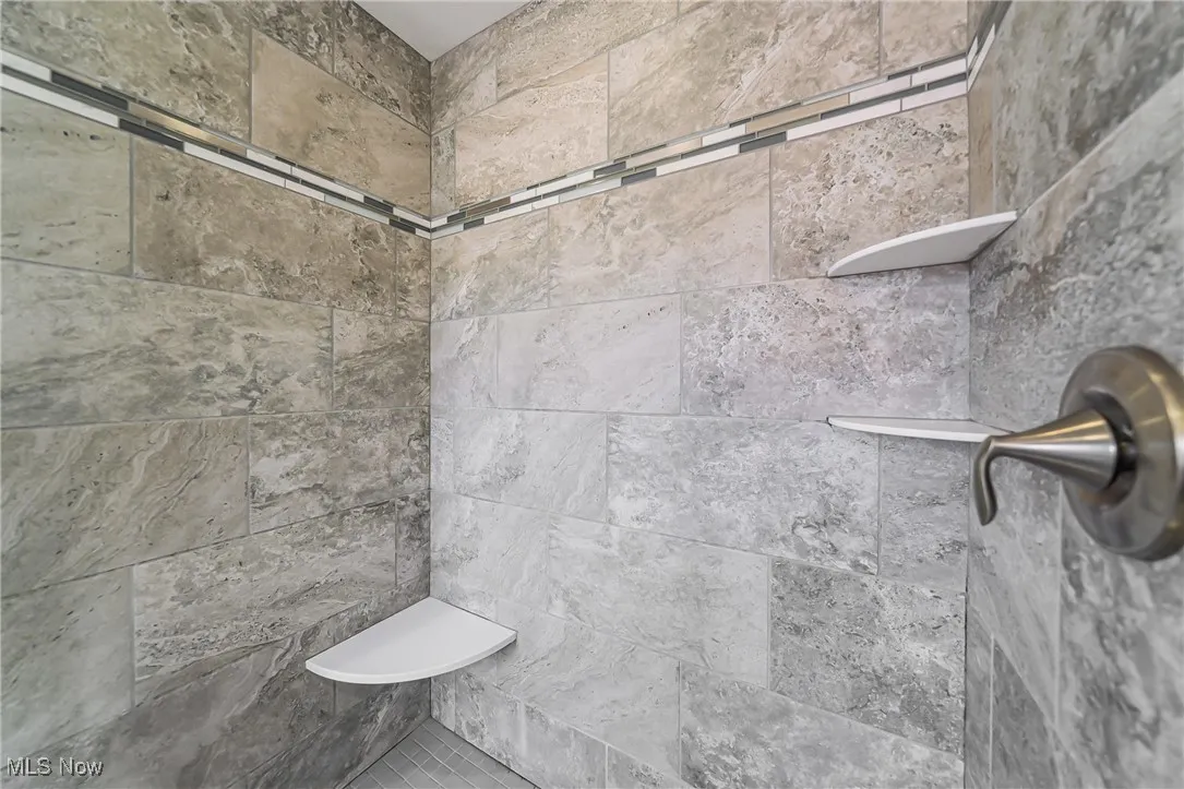 Bathroom view of tiled shower