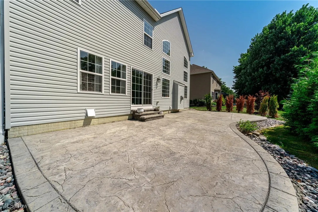 View of patio featuring entry steps