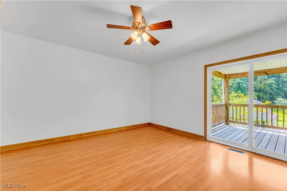 Bedroom featuring light wood-style floors and a ceiling​​‌​​​​‌​​‌‌​‌‌​​​‌‌​‌​‌​‌​​​‌​​ fan