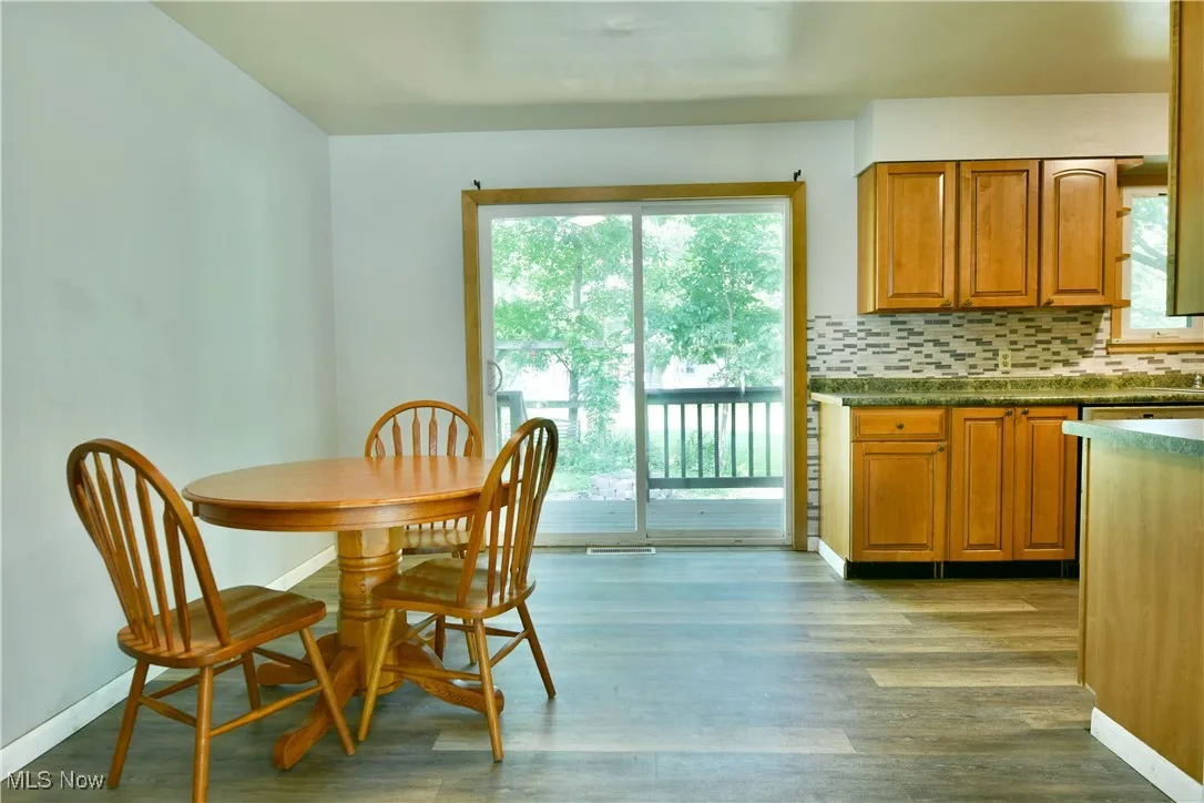 Dining room featuring plenty of natural light and wood finished floors