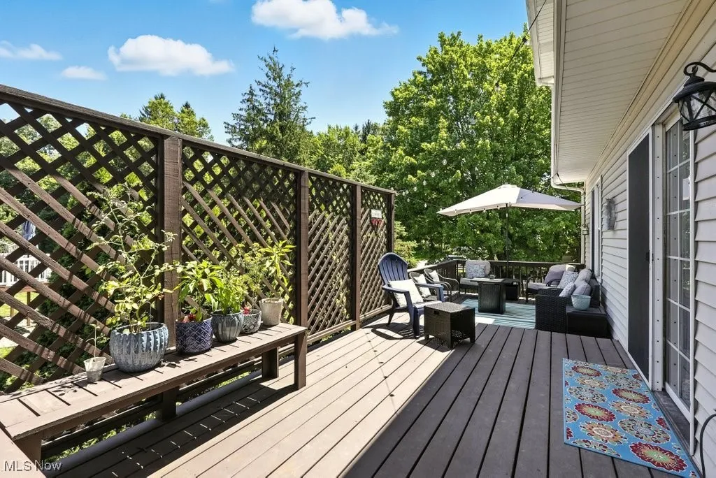 Wooden deck featuring an outdoor living space