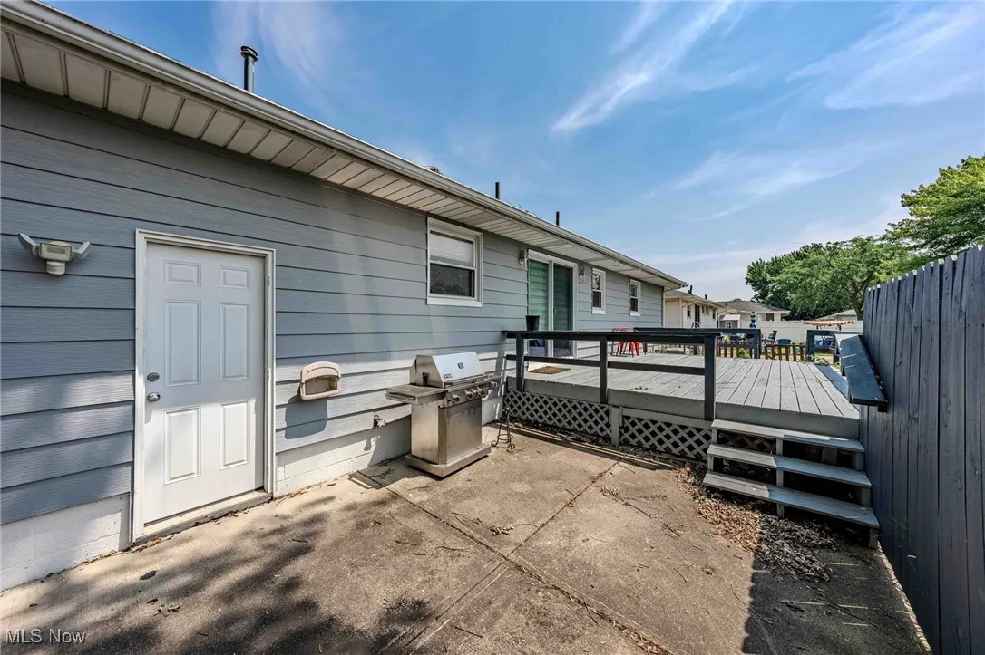 View of patio / terrace with a wooden deck and area for grilling