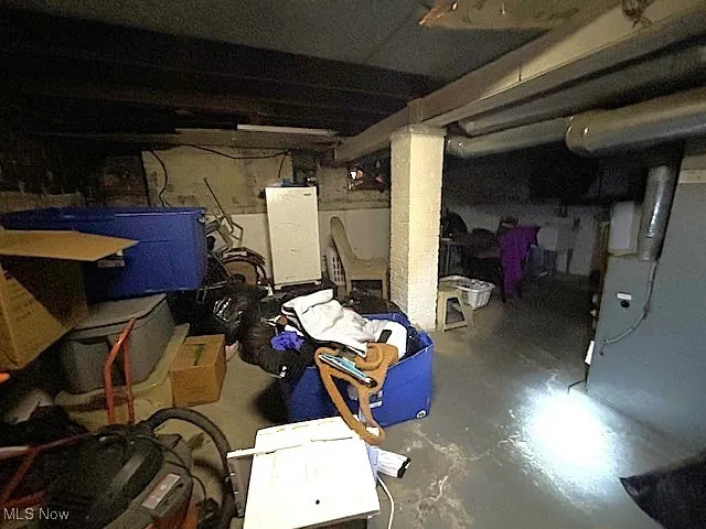 Unfinished basement with heating unit