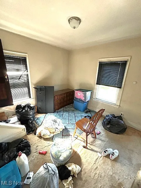 Bedroom with baseboards