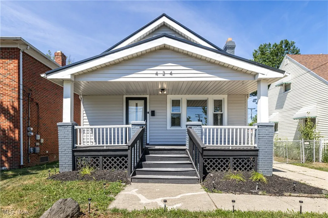 Shotgun-style home with covered porch