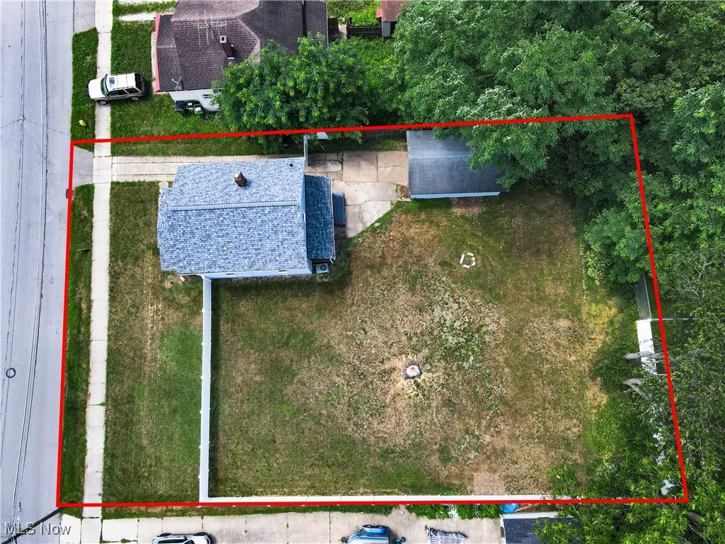 Aerial overview of property's location featuring property parcel outlined